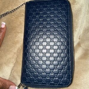 Gucci Navy Embossed Clutch with unbranded Chain. COA included.